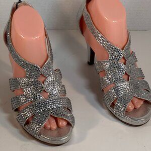 Ladies size 8.5 silver heels
